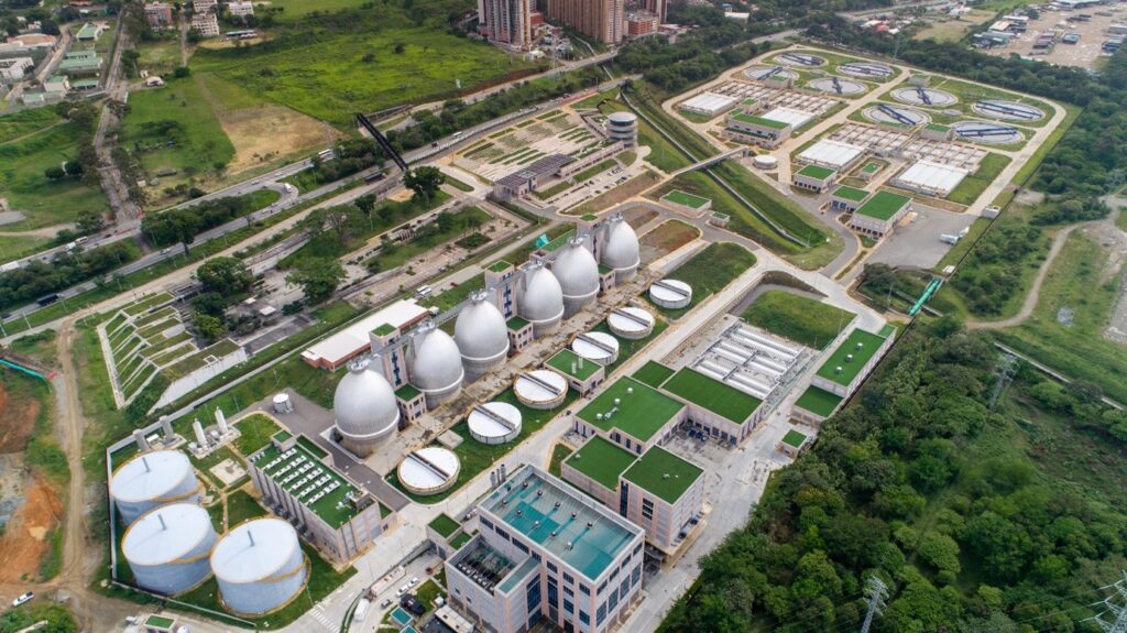 Aerial view of the Bello Wastewater Treatment Plant in Medellín, Colombia, with anaerobic digesters and treatment basins. Aerial view of the Bello Wastewater Treatment Plant in Medellín, Colombia, with anaerobic digesters and treatment basins.