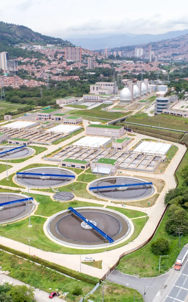 Aerial view of a wastewater treatment plant with circular clarifiers and aeration tanks in Medellin Columbia Aerial view of a wastewater treatment plant with circular clarifiers and aeration tanks in Medellin Columbia
